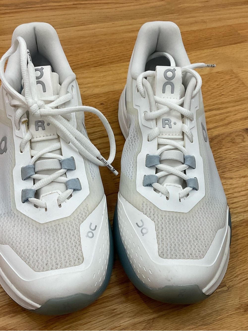 On Running women’s White and Blue Athletic Running Shoes